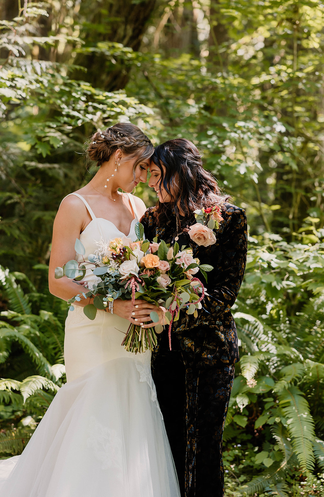 married couple posing in the forest with a bridal bouquet Camp Colton - A Mystical Oregon Wedding Venue