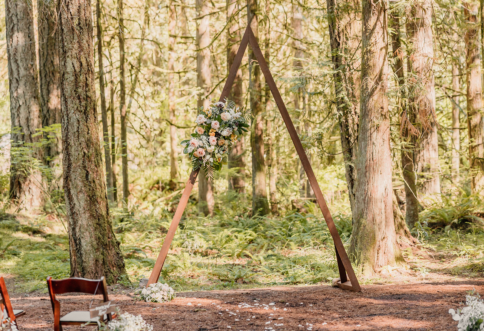 a bohemian wedding arch in the forest Camp Colton - A Mystical Oregon Wedding Venue