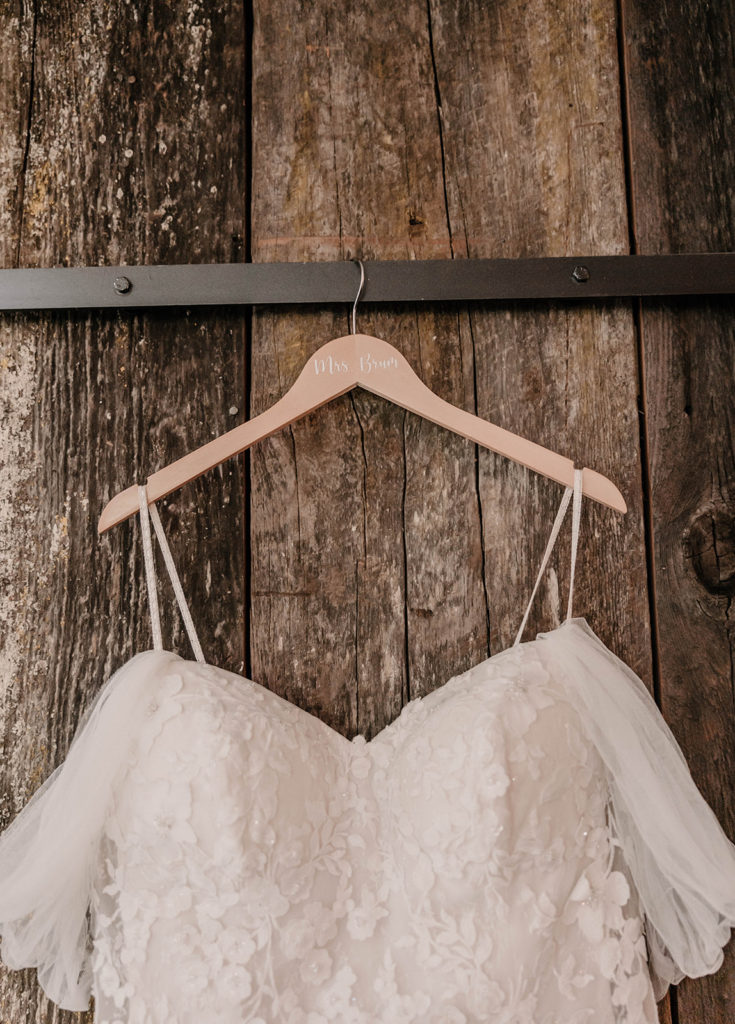 Elegant wedding dress with custom bridal hanger