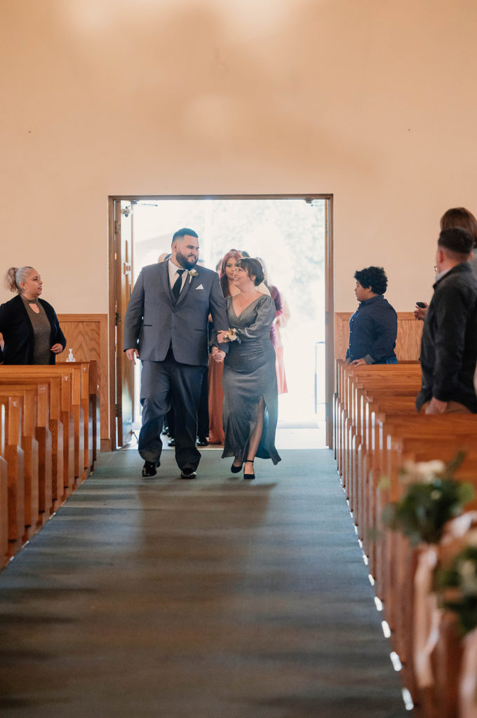 Groom walking to the altar for An Intimate Wedding at St. Rose of Lima Catholic Church in Santa Rosa, CA