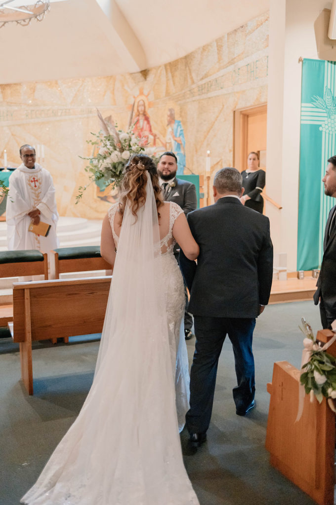 Bride and her father walking down the aisle for An Intimate Wedding at St. Rose of Lima Catholic Church in Santa Rosa, CA