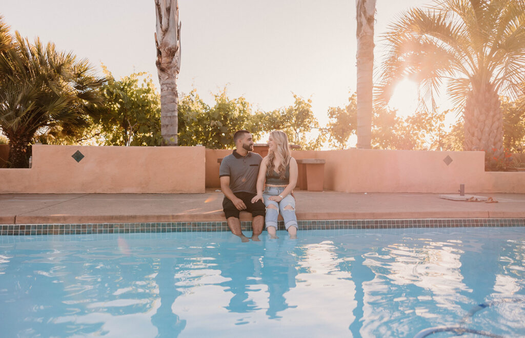 Engagement photos by a pool