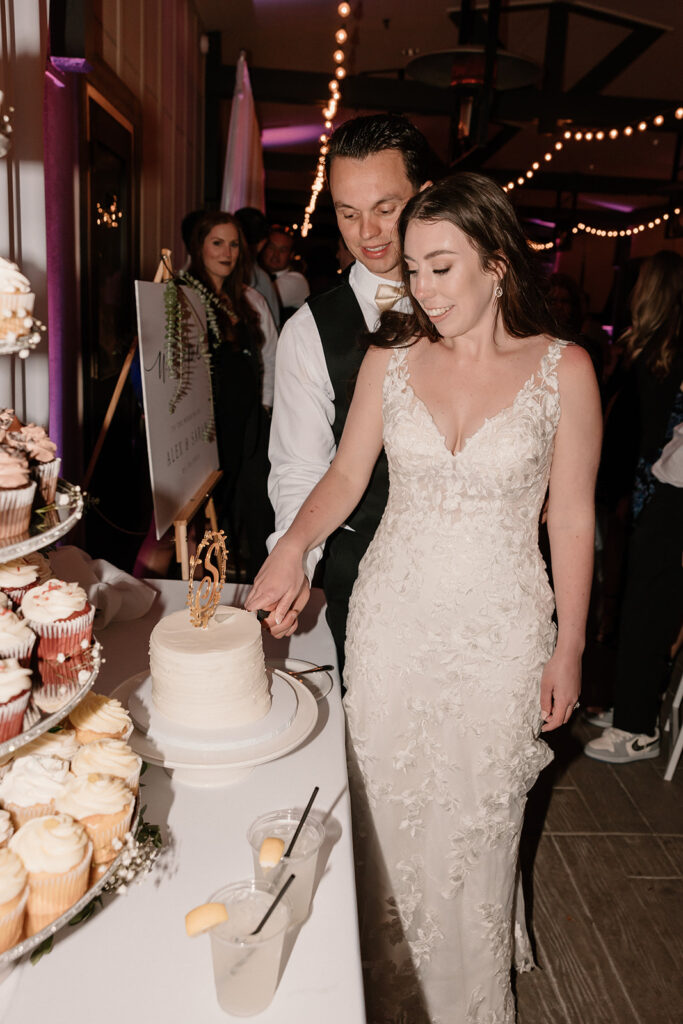 Bride and grooms wedding cake smash