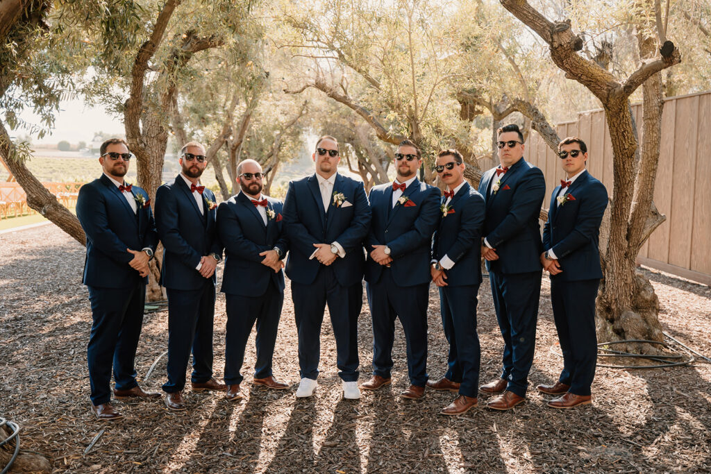 Groom and groomsmen photos from a California vineyard wedding at Leal vineyards