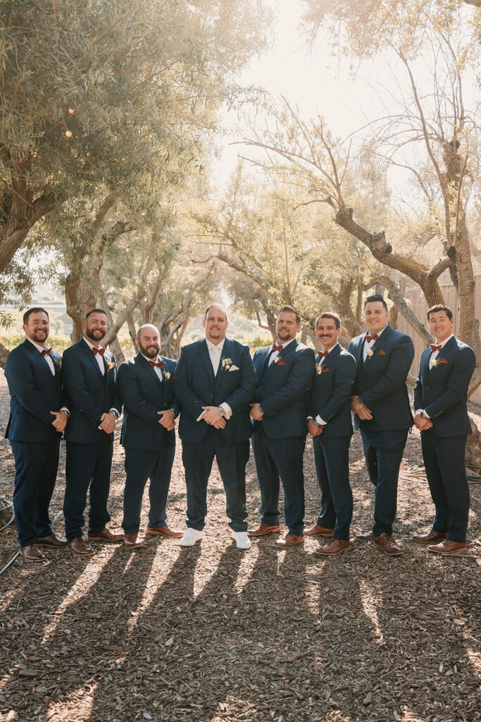 Groom and groomsmen photos from a California vineyard wedding at Leal vineyards