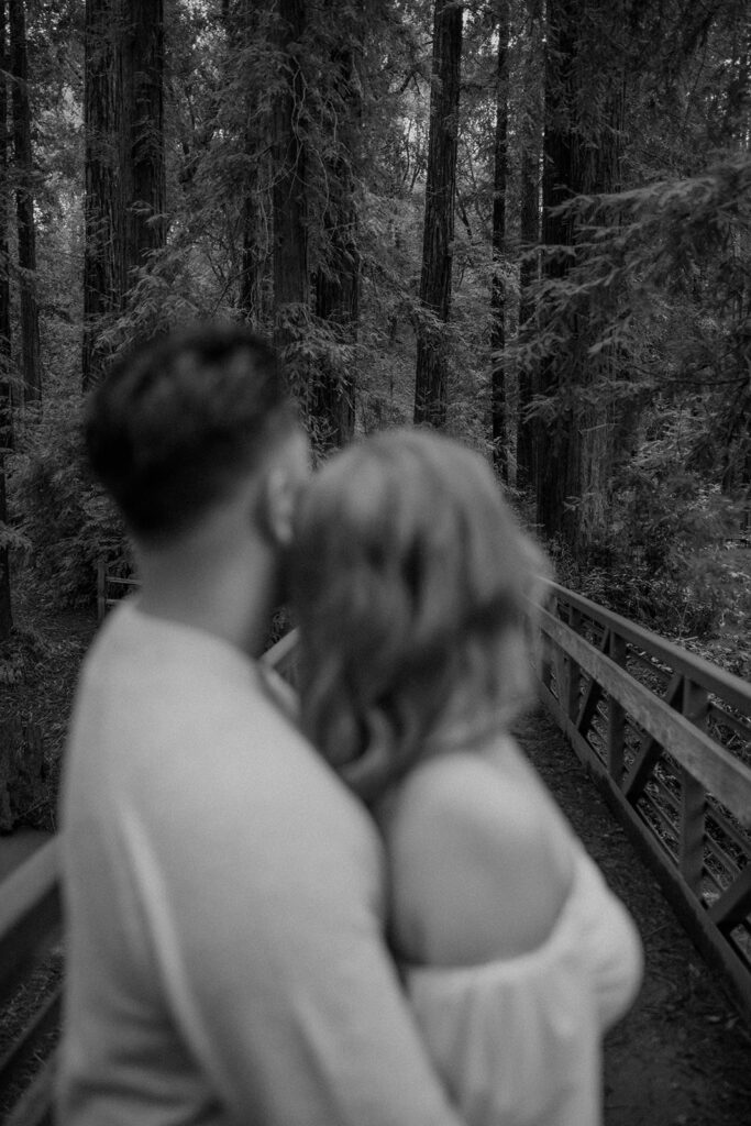 black and white loving couples photos in redwoods forest