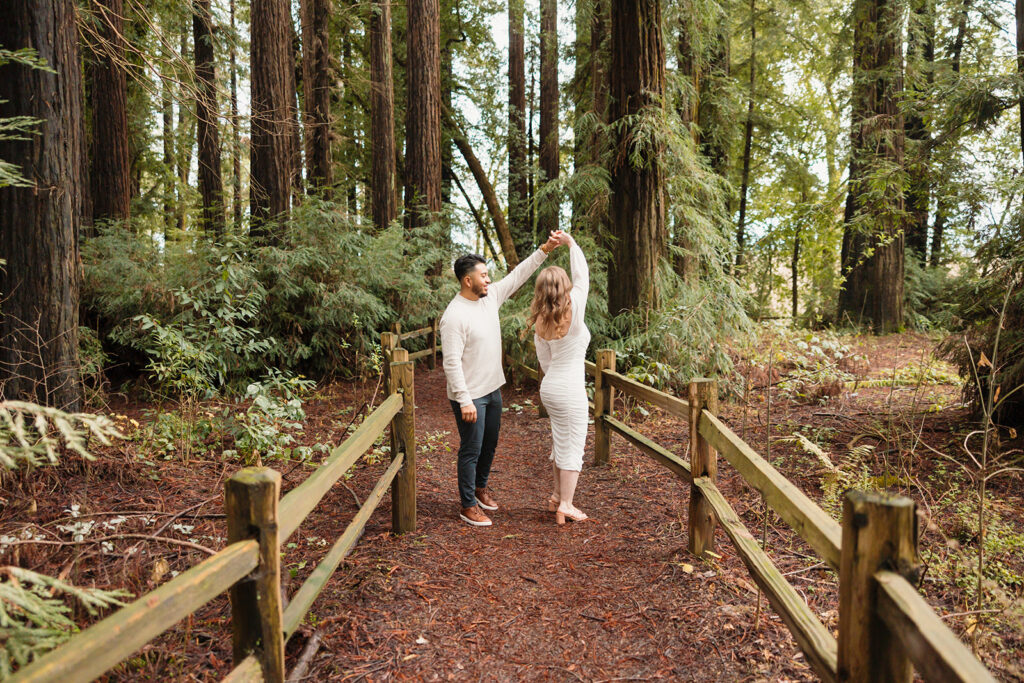 Couples engagement photos in redwoods forest