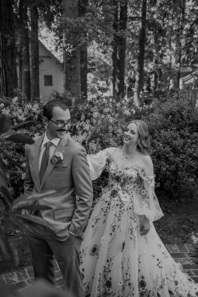 couple posing for wedding photos 
