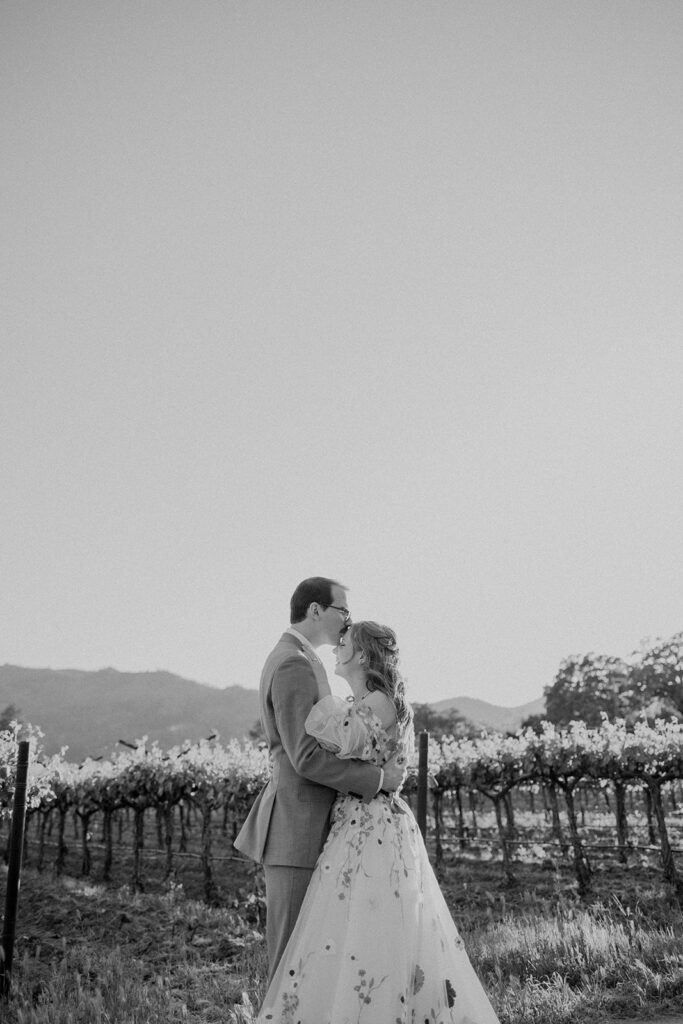 bride and groom taking wedding photos
