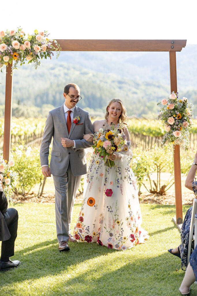 couple posing for wedding photos 
