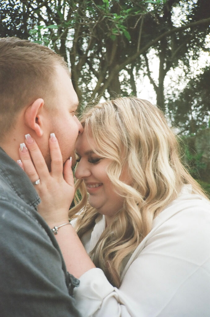 couple posing for their engagement session
