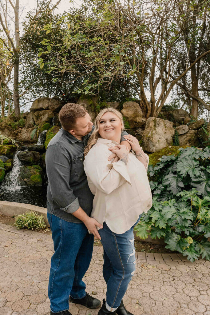 couple posing for their engagement session
