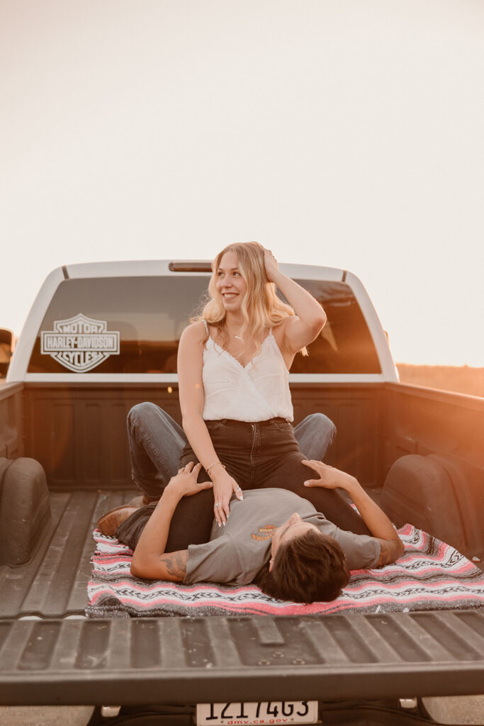 couple posing for engagement photos
