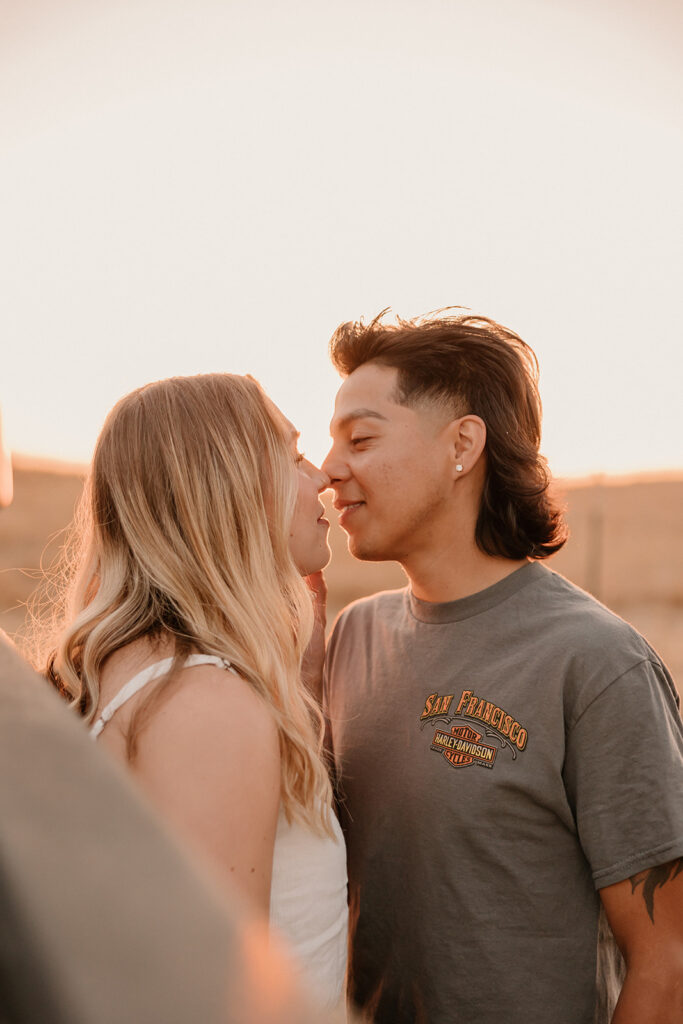 couple posing with their truck
