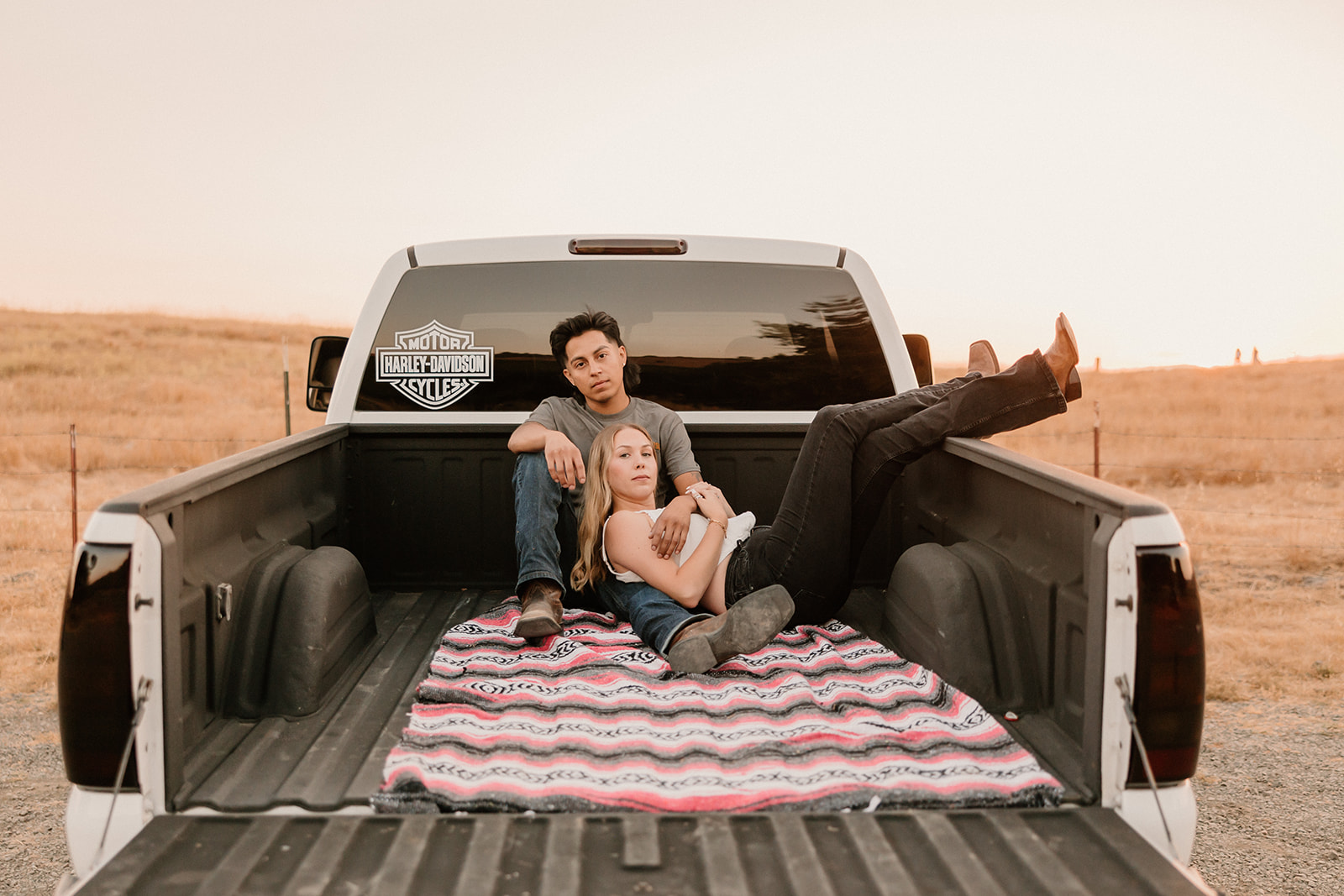 couple posing for engagement photos