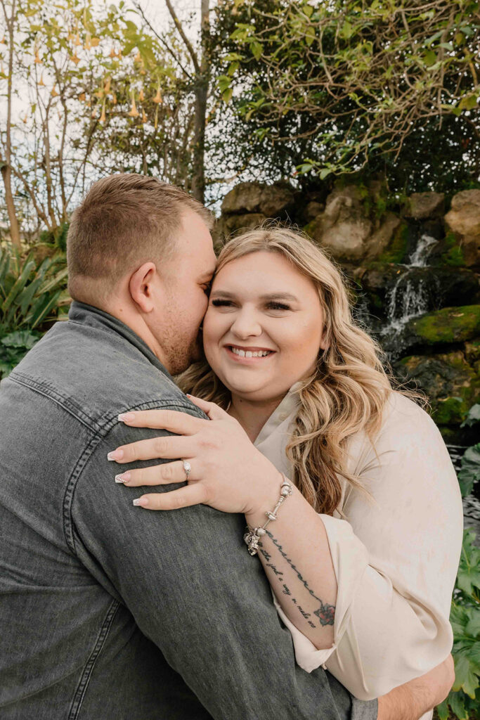 couple posing for their engagement session
