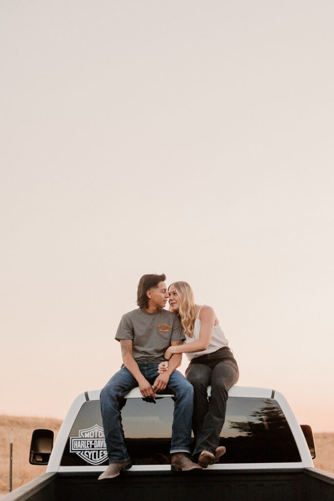 couple posing for engagement photos
