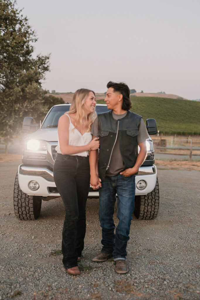 couple posing with their truck in Rohnert Park
