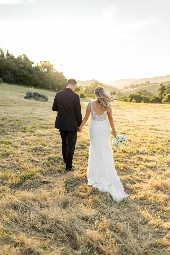 couple posing for wedding photos
