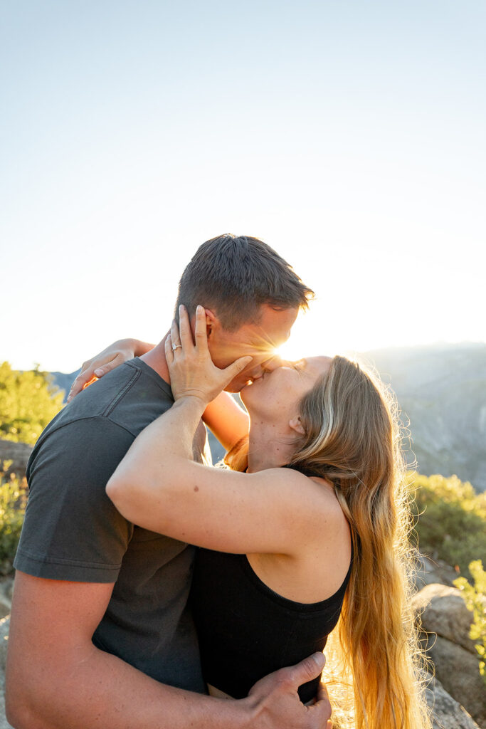 couple taking engagement photos in yosemite