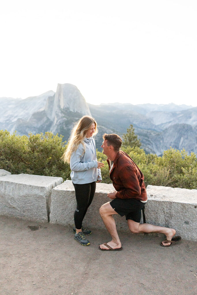 couple taking engagement photos in yosemite
