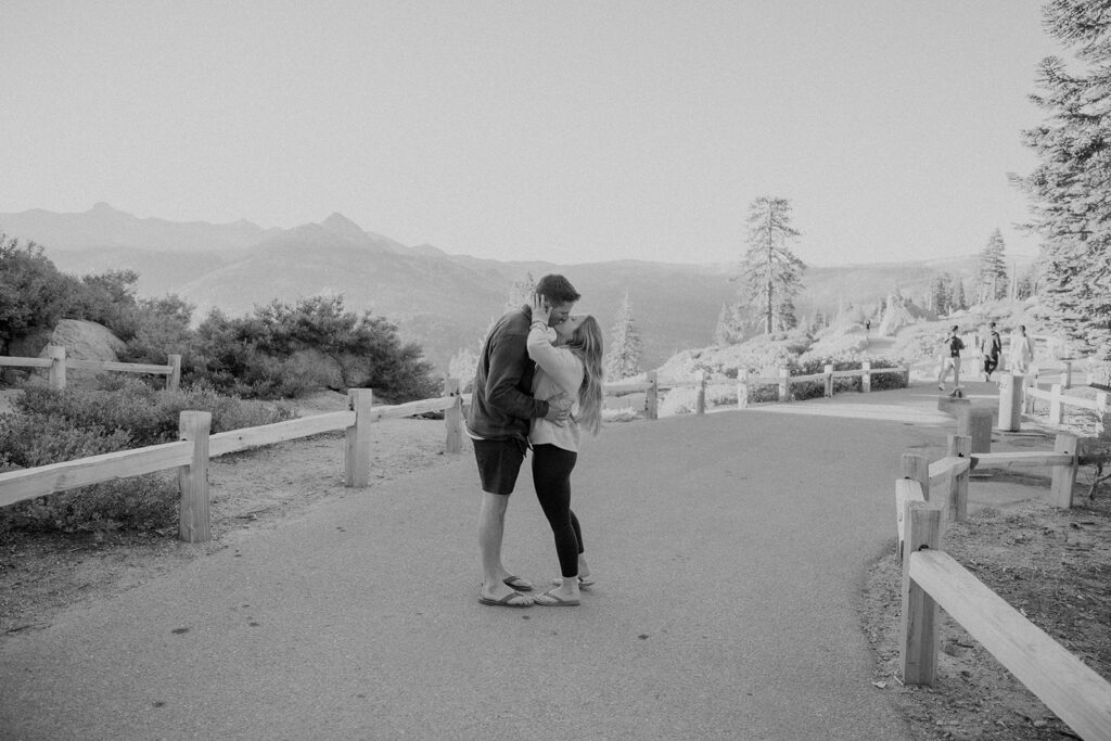 couple taking engagement photos in yosemite
