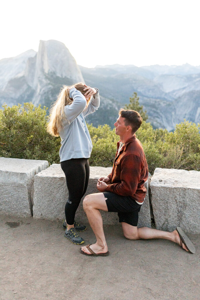 couple taking engagement photos in yosemite
