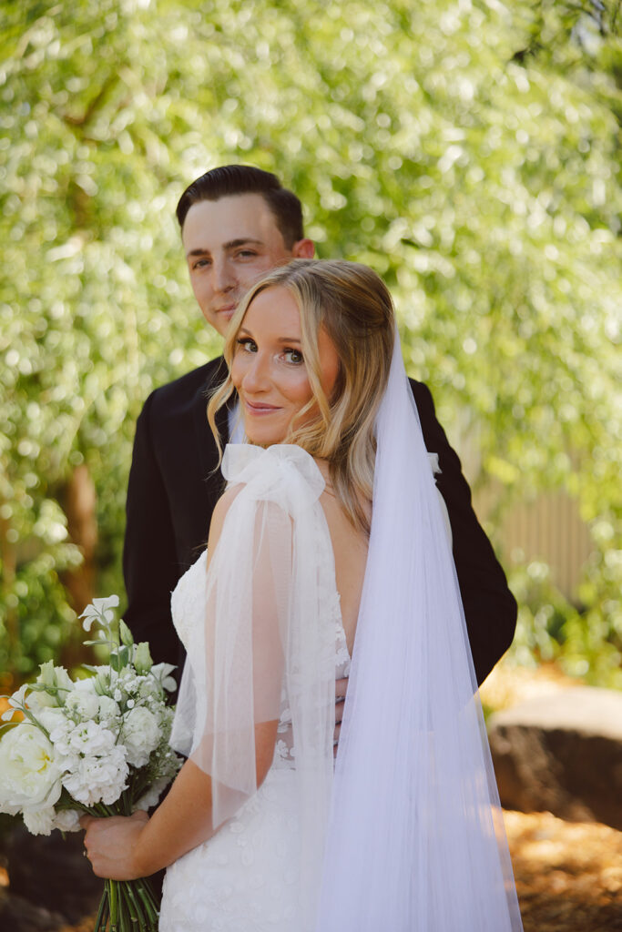 couple posing for wedding photos
