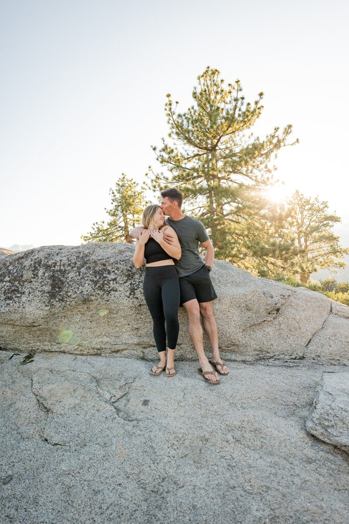 couple taking engagement photos in yosemite
