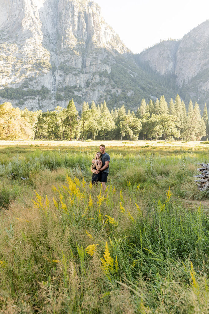 couple taking engagement photos in yosemite
