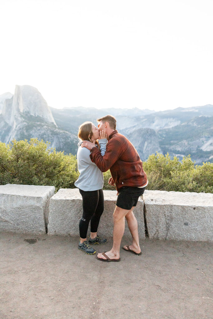 couple taking engagement photos in yosemite
