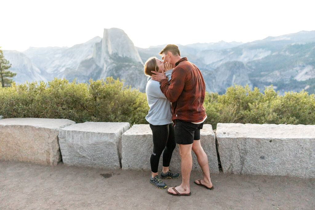 couple taking engagement photos in yosemite
