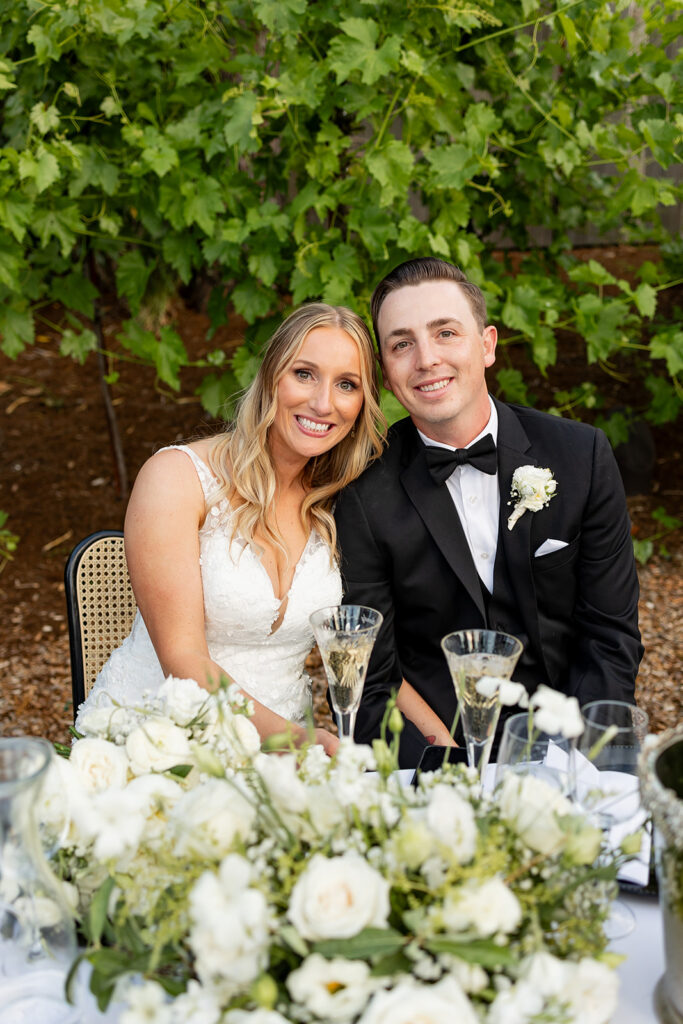 couple posing for wedding photos
