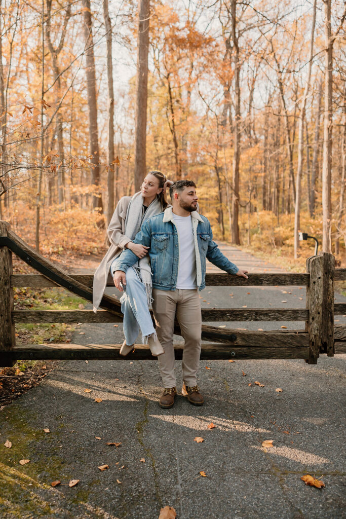 Couple taking engagement photos outside
