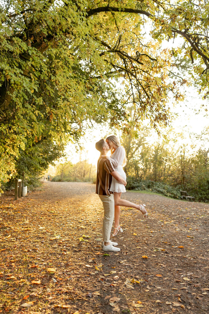 couple outside posing for engagement photos
