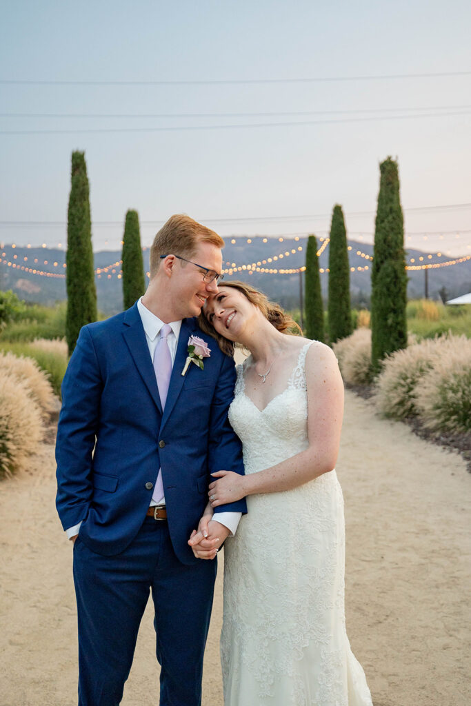 a couple posing for their wedding portraits
