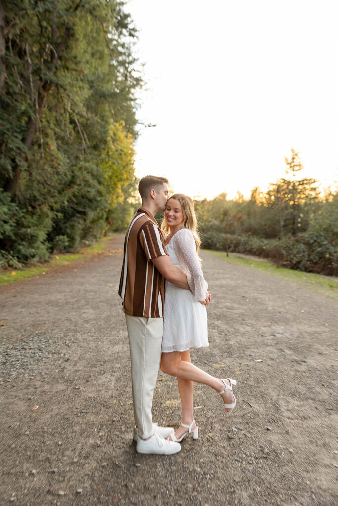 Newly Engaged couple taking couples photos
