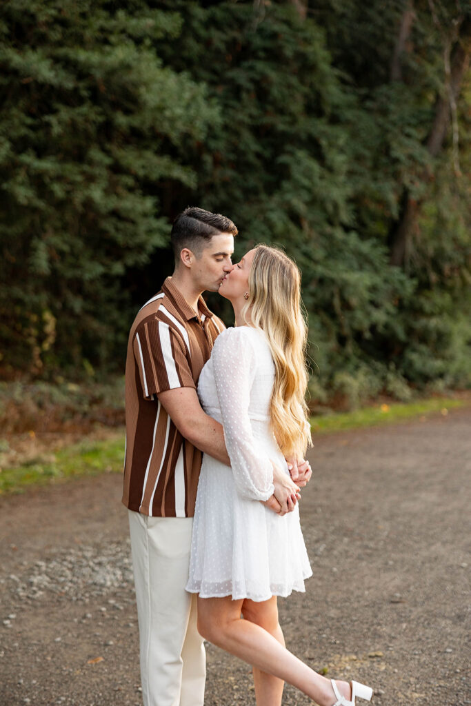 Newly Engaged couple taking couples photos
