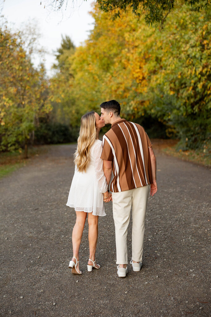 Newly Engaged couple taking couples photos
