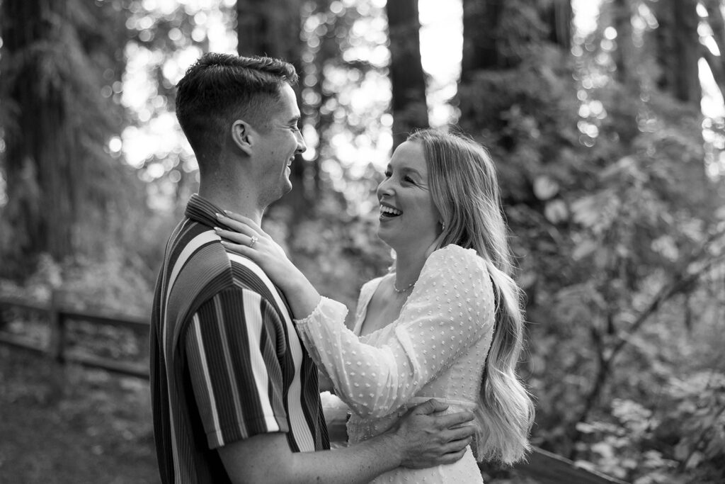 couple outside posing for engagement photos
