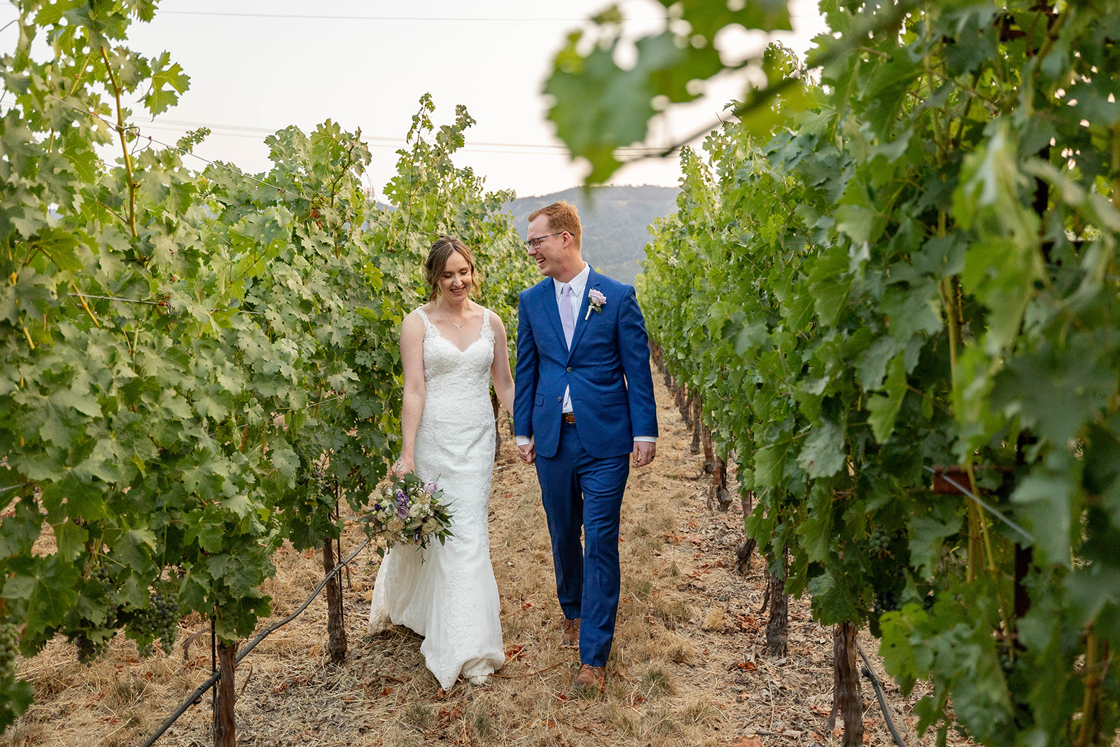 a couple posing for their wedding portraits